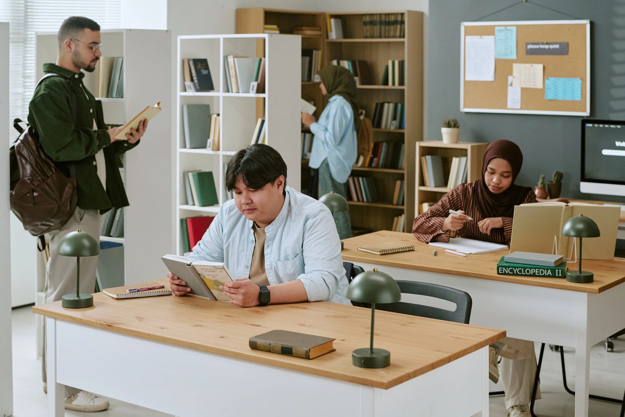 Students studying together in a library